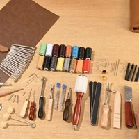 Комплект-инструменти-за-кожа-92-части-за-гравиране-пробиване-щамповане-и-шиене-с-кожена-чанта-за-съхранение